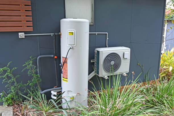 Heat pump hot water system installed on the side of a Melbourne home after switching from gas under the Victorian VEU rebate program